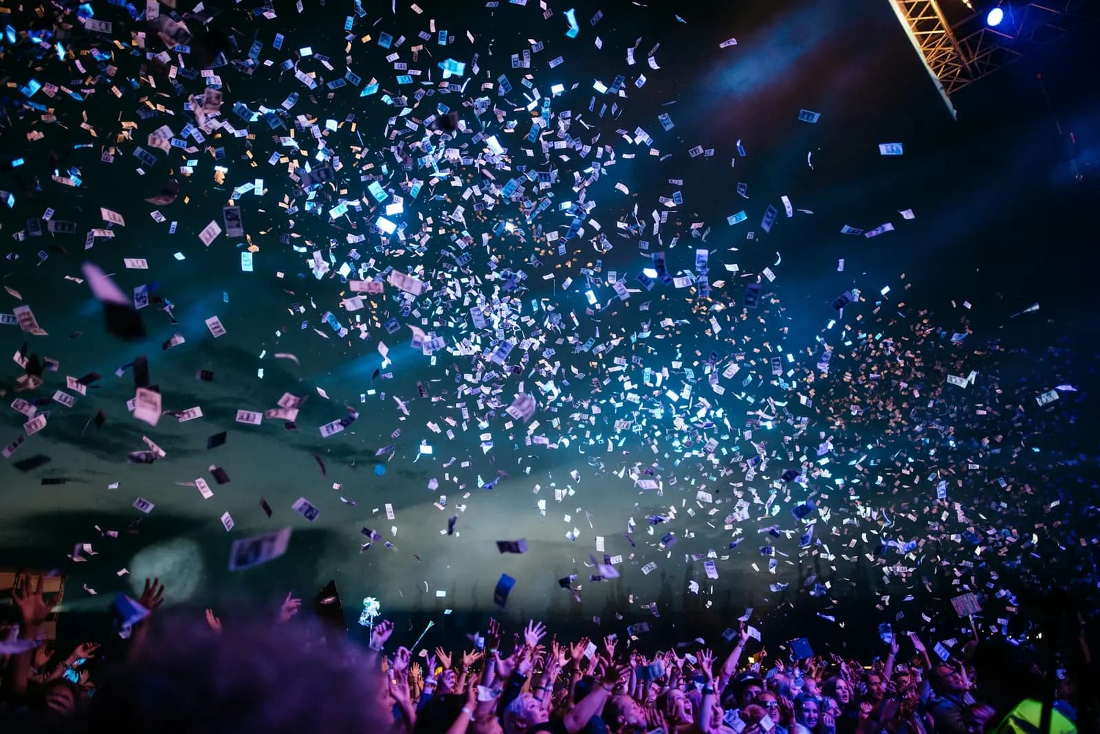Confetti over a cheering crowd
